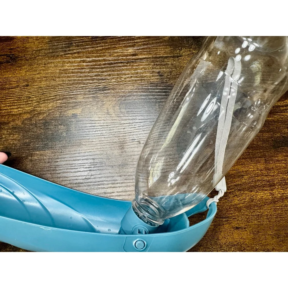 Plastic Pet Traveling Water Bottle with Wrist Strap, used once